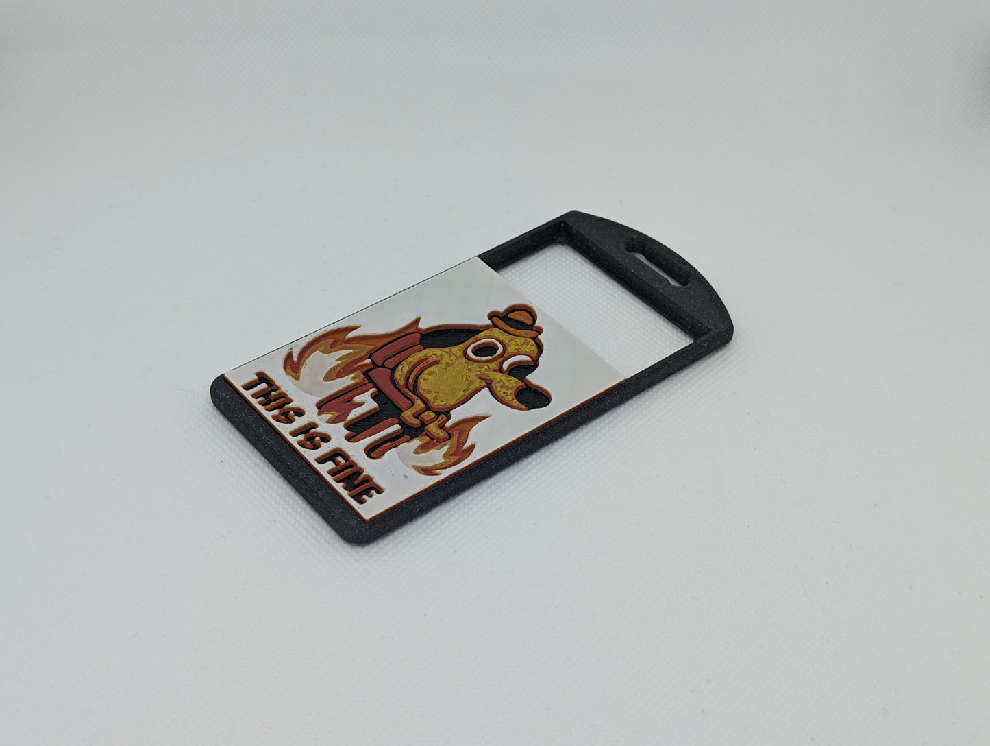 'This is fine' meme over galaxy black or red (your choice) badge holder