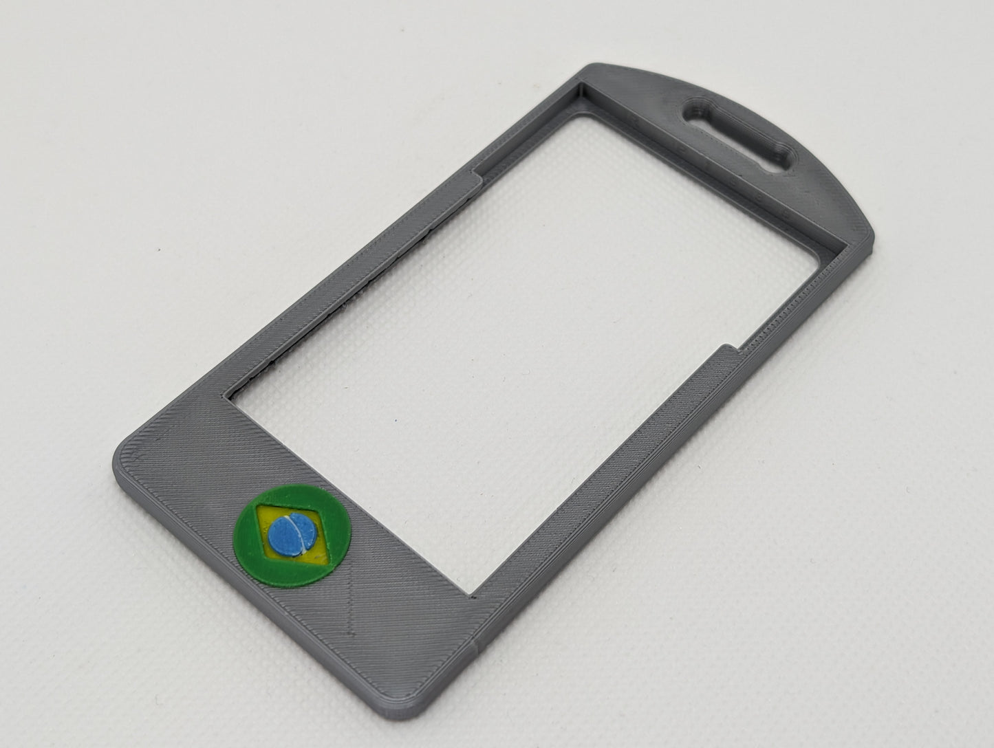 Brazilian flag icon badge on grey base