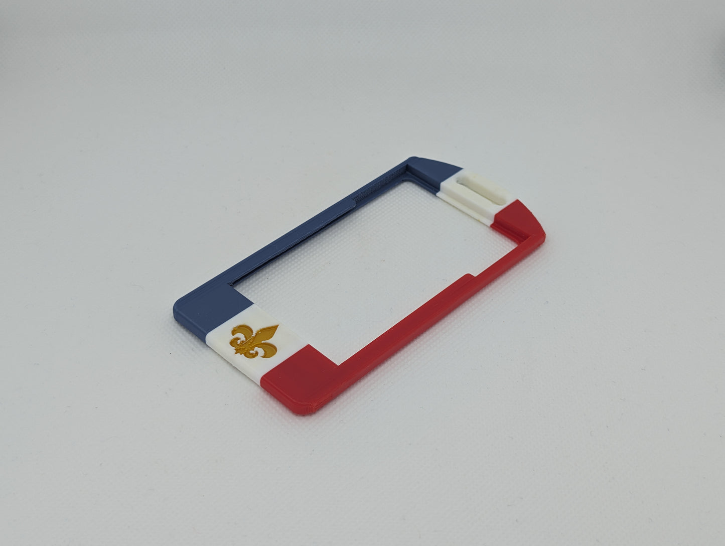 French flag badge (3 colour base) + fleur de lis (embedded)