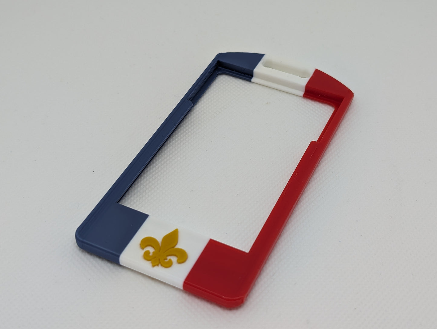 French flag badge (3 colour base) + fleur de lis (raised)