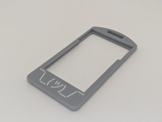 White shruggie flat on grey badge
